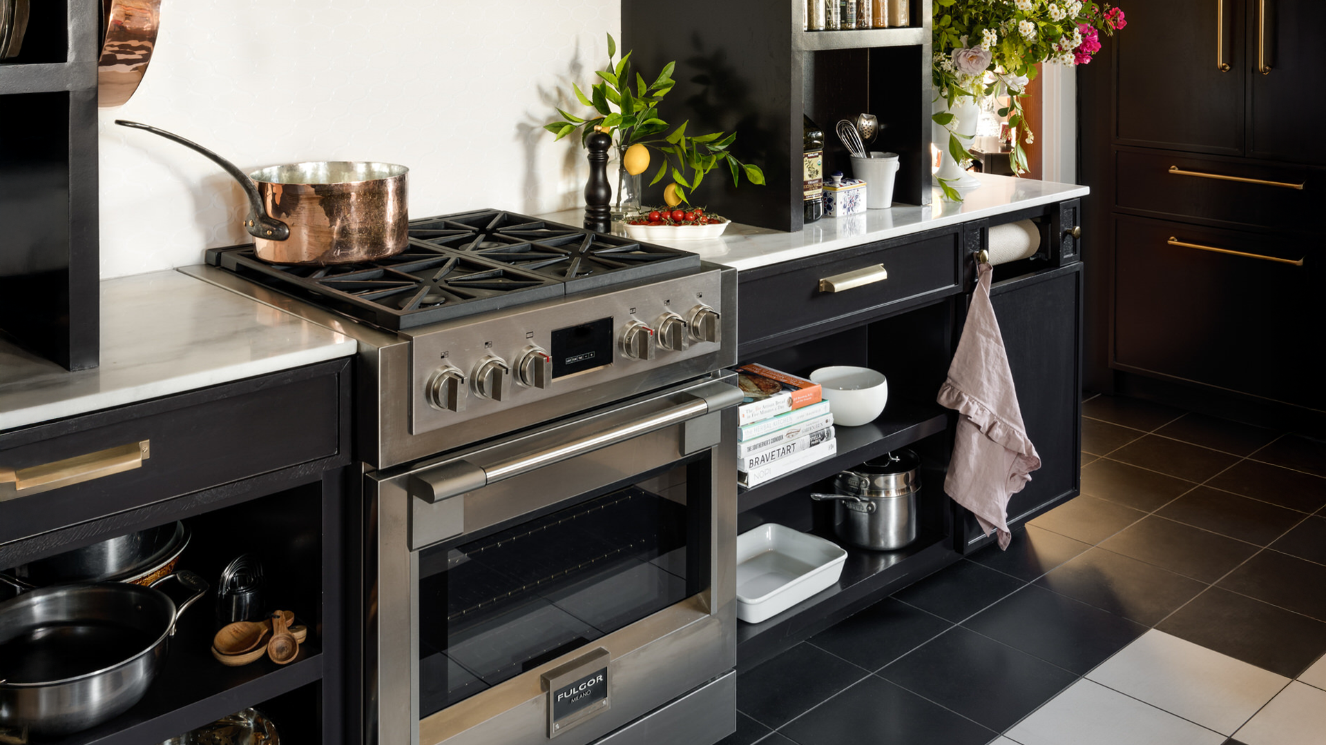 Luxury appliance with dark backdrop cabinets